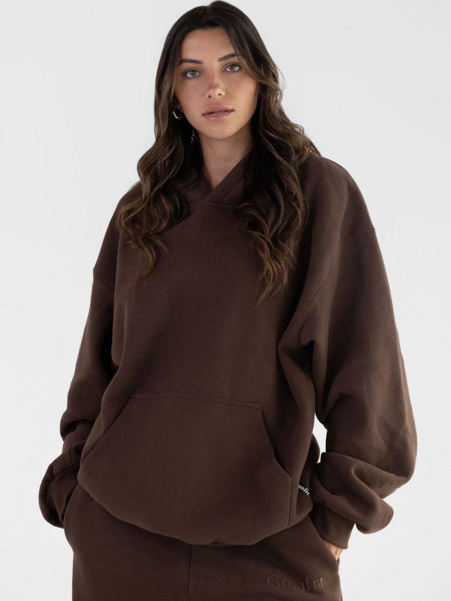 Comfrt Minimalist Hoodie in brown worn with matching sweatpants - oversized fit
